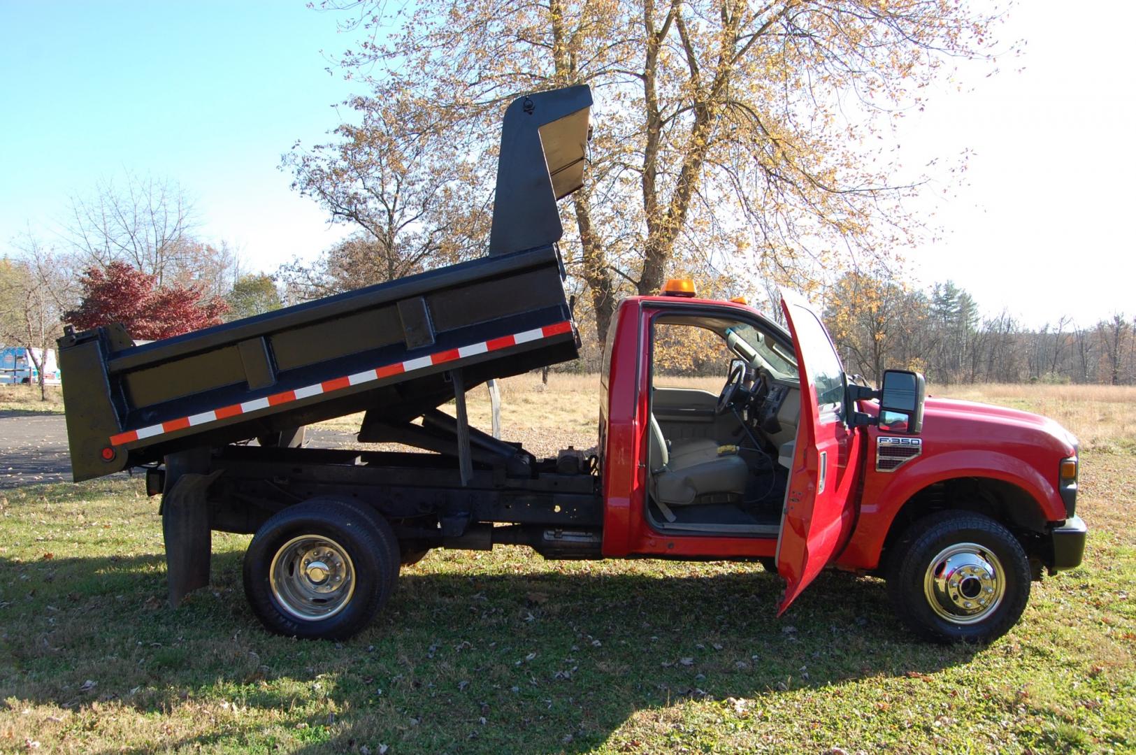 2008 RED /Grey Vinyl Ford F-350 SD XL DRW 4WD (1FDWF37R68E) with an 6.4L V8 OHV 32V TURBO DIESEL engine, Manual transmission, located at 6528 Lower York Road, New Hope, PA, 18938, (215) 862-9555, 40.358707, -74.977882 - This vehicle has a reconstructed title. Here we have a 2008 Ford F350 dump body with a 6.4L V8 Diesel engine putting power to the ground via a manual shifting 4X4 transmission. The interior offers grey leather, AC/HEAT, AM/FM radio, roll up windows and front airbags for safety. The exterior offers r - Photo#6